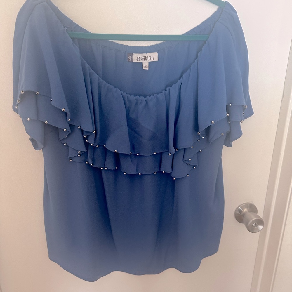JLo blouse off shoulders